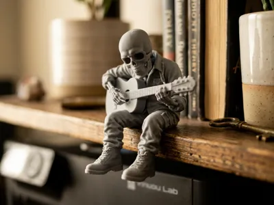 The Guitarist - Skull Edge Sitter